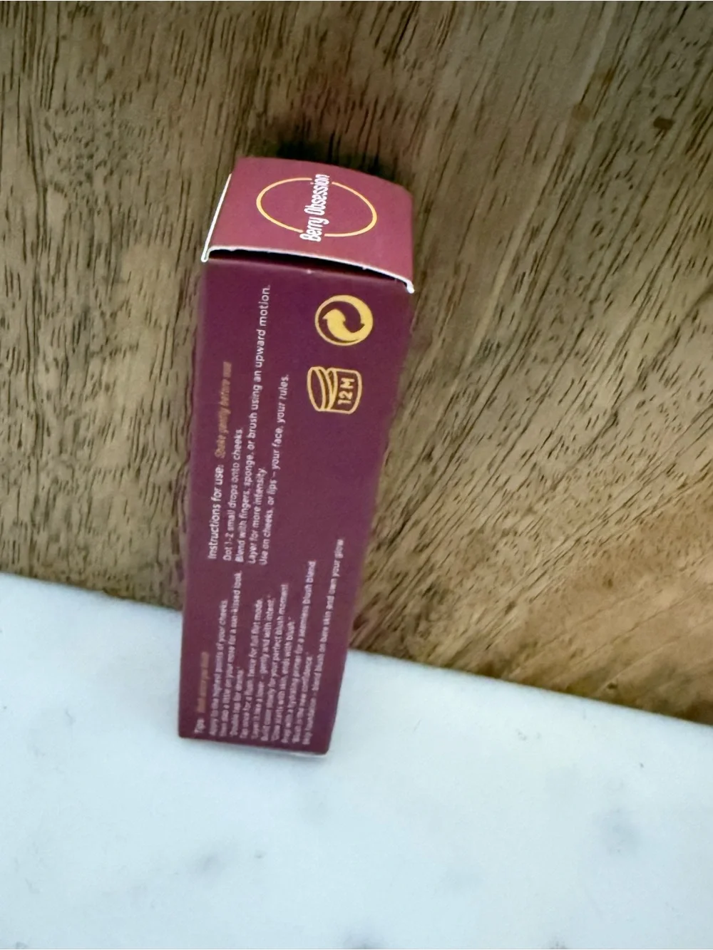 Plum-Colored Cosmetic Box with Gold Emblems